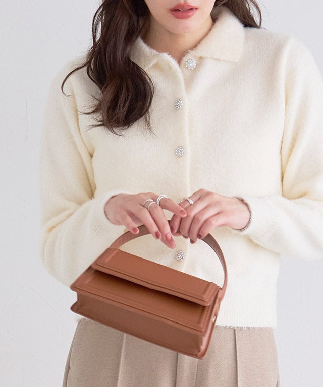 ビジューボタンポロニット